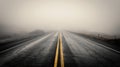 a long empty highway disappearing into thick fog in the distance Royalty Free Stock Photo