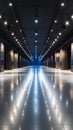 Long Empty Modern Hall with Spotlights and Reflections on a Polished Floor Royalty Free Stock Photo