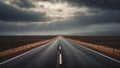 Empty Highway Stretches Into the Distance Under a Dramatic Sky in Iceland Royalty Free Stock Photo