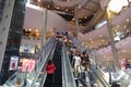 Long escalators in Terminal 21 shopping mall.