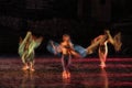 Long exposed and colorful photo of the ballerinas and ballets performing their art in a musical.