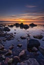 Long exposure of Baltic sea with beach stones during sunset, Dune island, Schonberg, Germany Royalty Free Stock Photo