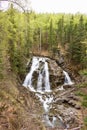 Smooth Waterfall in a Dense Forest Royalty Free Stock Photo