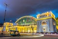 Long exposure, car lights running, tricycle parked in front of Bangkok Railway Station Royalty Free Stock Photo