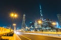 Long exposure of cars passing on highway in front of Burj Khalifa Dubai - UAE Royalty Free Stock Photo