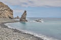 Long exposure at the coastline of la Gomera, Spain. Playa de la Caleta. Rock formation at the beach Royalty Free Stock Photo
