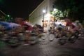 Long exposure of cyclists driving through McKinney, United States during Bike the Bricks