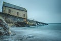 Long exposure. Disused lifeboat station at Polpeor Cove, Lizard Point, Cornwall Royalty Free Stock Photo