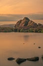 A long exposure of Doxey pool at sunset. With heather in full bloom Royalty Free Stock Photo