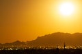 Long exposure of the full moon rising on the desert and city of Phoenix Royalty Free Stock Photo