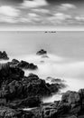 Long exposure greyscale shot of the seascape in Guernsey