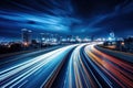 Long exposure high speed traffic light trails over a highway, Motorway and Junction in big city. High speed motion blur, light Royalty Free Stock Photo