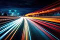 Long exposure high speed traffic light trails over a highway, Motorway and Junction in big city. High speed motion blur, light Royalty Free Stock Photo