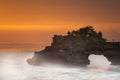 Long exposure of Hindu temple Pura Tanah Lot and sunset Bali, Indonesia. Royalty Free Stock Photo