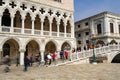 Long exposure image of crowds of tourists stopping at the Bridge of Sighs at St Marks Square, Venice