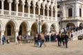 Long exposure image of crowds of tourists stopping at the Bridge of Sighs at St Marks Square, Venice