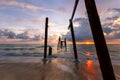 Long exposure image of Dramatic sky seascape with Old wooden pole in the sea sunset or sunrise scenery background Royalty Free Stock Photo