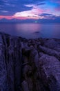 Long exposure image of Dramatic sky seascape with rocks in the foreground sunset or sunrise scenery background Beautiful light of Royalty Free Stock Photo