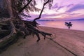 Long exposure image of dramatic sunset or sunrise,sky clouds over tropical sea with fishing boats in the sea. Royalty Free Stock Photo