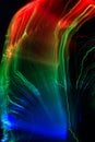 Vibrant coloured lightning trails from fibre optic strands. Intentional camera movement. Royalty Free Stock Photo