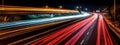 A long-exposure image of light trails from moving vehicles at night, creating a sense of motion and excitement. Web banner