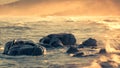 Sea washing over rocks at sunrise in Corsica Royalty Free Stock Photo