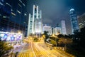 Long exposure of an intersection and modern skyscrapers at night Royalty Free Stock Photo