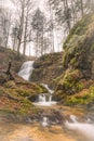 Long Exposure of Josefstaler Waterfall in Autumn Atmosphere in Bavaria, Germany