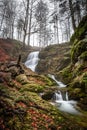 Long Exposure of Josefstaler Waterfall in Autumn Atmosphere in Bavaria, Germany