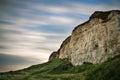 Long exposure landscape of motion blur sky over vibrant cliffs Royalty Free Stock Photo