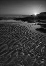 Long exposure landscape rocky shoreline at sunset black and whit Royalty Free Stock Photo