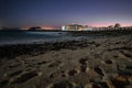 Long exposure of a lava beach. Sandy beach in the morning. Bay, coast, Corralejo, Las Palmas Province, Spain Royalty Free Stock Photo