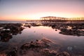 Long exposure of a lava beach. Sandy beach in the morning. Bay, coast, Corralejo, Las Palmas Province, Spain Royalty Free Stock Photo