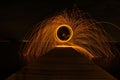 Long exposure light painting on the boardwalk on a lake