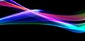 Long exposure, light painting photography. Vibrant streaks of neon color against a black background Royalty Free Stock Photo