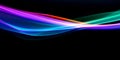 Long exposure, light painting photography. Vibrant streaks of neon color against a black background Royalty Free Stock Photo