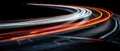 Long exposure of light trails on curved highway at night Royalty Free Stock Photo