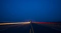 Long exposure of light trails on a dark highway Royalty Free Stock Photo