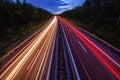 Long exposure of the lights of the cars on the road at sunset Royalty Free Stock Photo