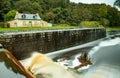 Long exposure on the lock of a canal. Royalty Free Stock Photo