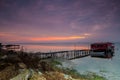 Long exposure of magic sunrise over the ocean with a hut in the Royalty Free Stock Photo