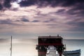 Long exposure of magic sunrise and a wooden hut. Royalty Free Stock Photo