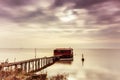 Long exposure of magic sunrise and a wooden hut. Royalty Free Stock Photo