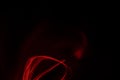 Long exposure movement of a red lantern in the dark close-up Royalty Free Stock Photo
