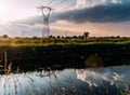 Long exposure of moving water and clouds at sunset overlooking the Naviglio Pavese, Italy. The canal links the city of Milan and P Royalty Free Stock Photo