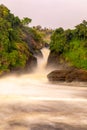 Long exposure of the Murchison waterfall on the Victoria Nile at sunset, Uganda. Royalty Free Stock Photo