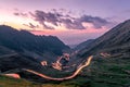 Long exposure with National Road 7C DN7C, nicknamed Transfagarasan from the Fagaras mountains. The lights of the nostrils draw Royalty Free Stock Photo
