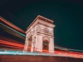 Long exposure nighttime photo of Arc de Triomphe on Champs Elysees avenue, Paris, France Royalty Free Stock Photo