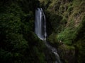 Long exposure panorama of tropical lush green protected forest waterfall cascade Peguche in Otavalo Imbabura Ecuador Royalty Free Stock Photo