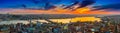 Long exposure panoramic cityscape of Istanbul at a beautiful dramatic clouds sunset from Galata to Golden Horn gulf. View